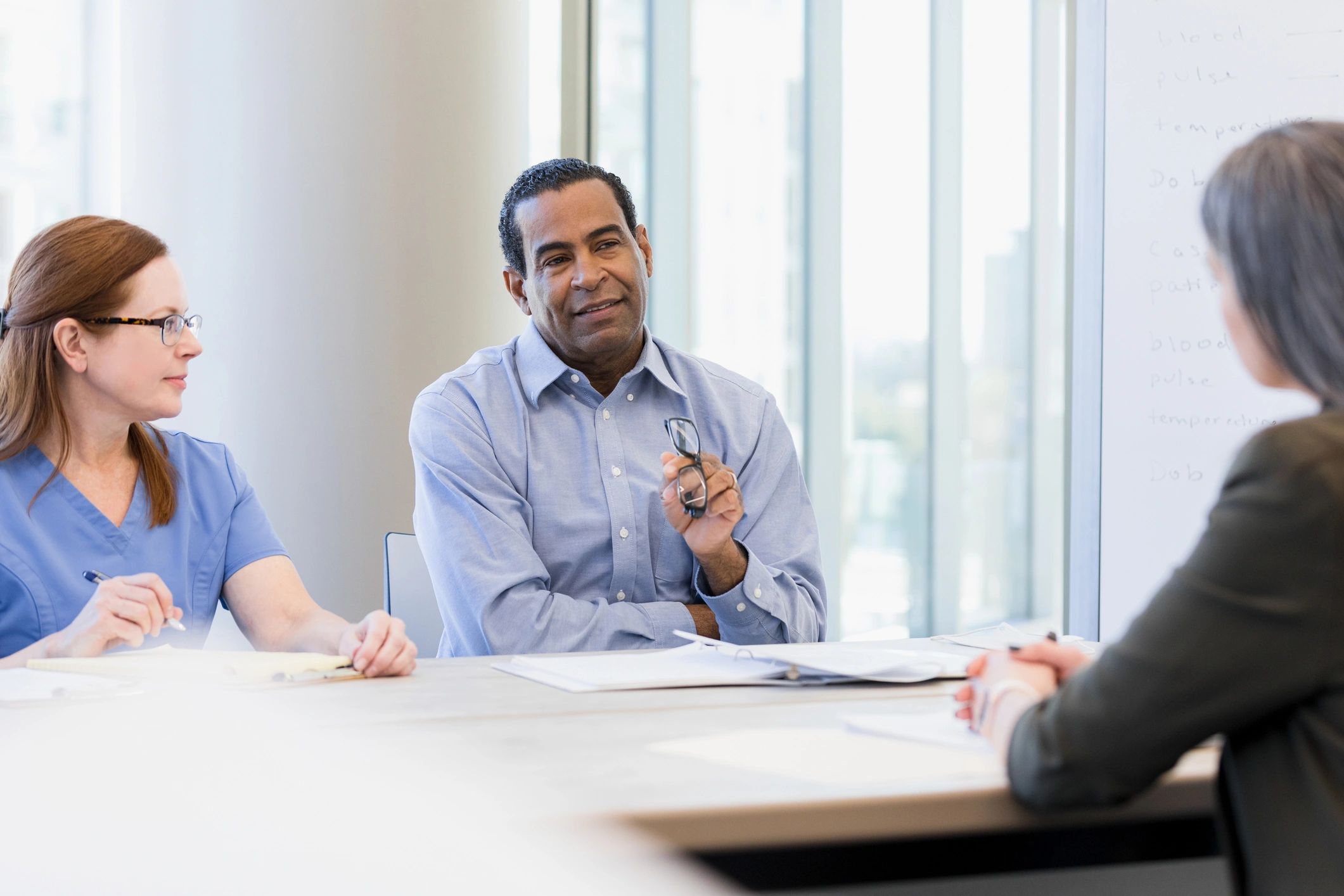 Healthcare team discussion in clinic